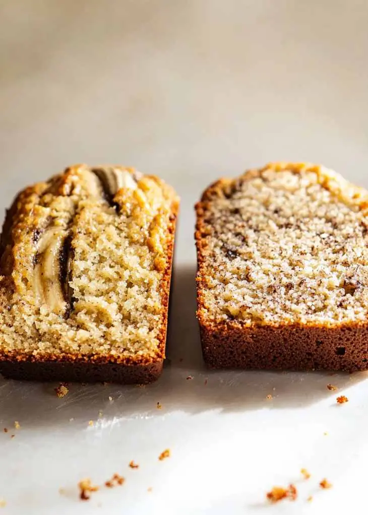 Easy Cake Mix Banana Bread (How to Prevent Sinking Every Time) 5 Cake mix banana bread batter with banana chunks in mixing bowl